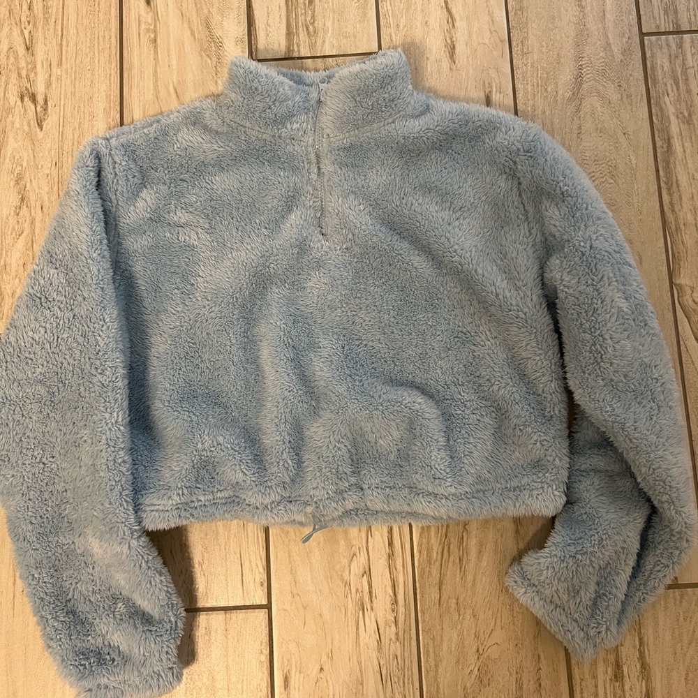 Light blue fluffy cropped sweatshirt